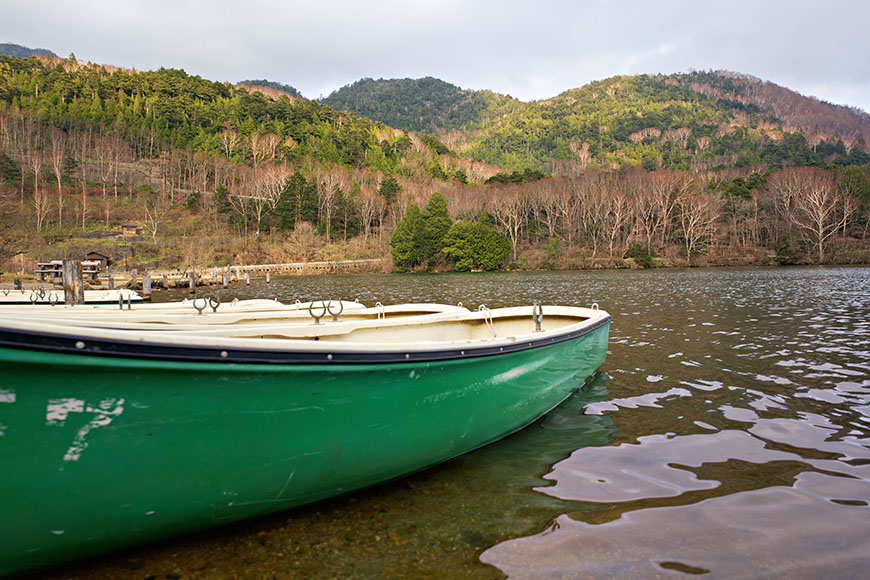 green boat on sea green boat on sea