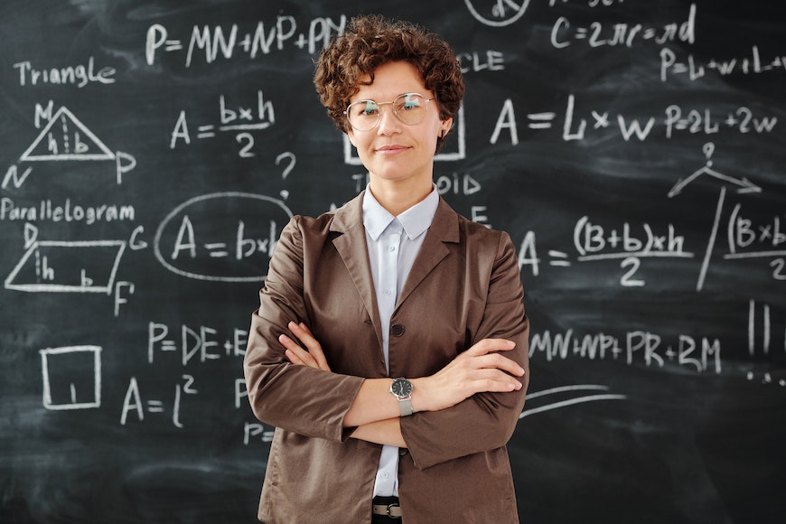 Woman with glasses arms folded