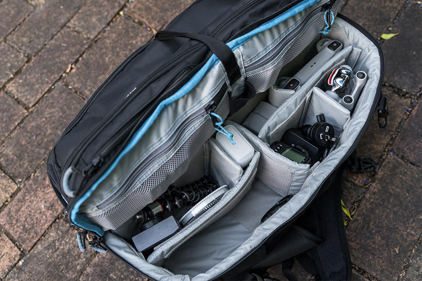 You'll find the main compartment is fairly deep, great for stacking items, tall lenses, and more. The DJI Mini 3 Pro fits vertical!