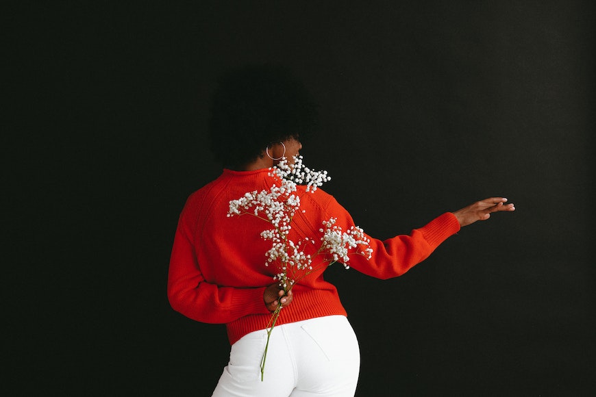 Red sweater white flowers