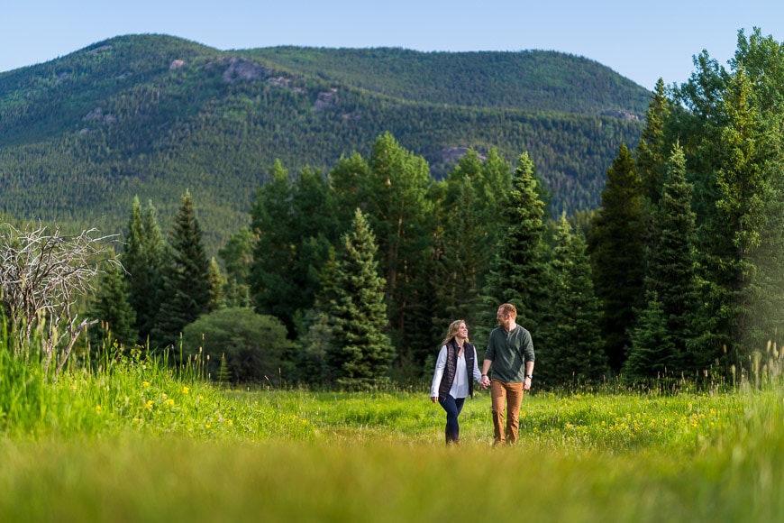 Couple in green hilly landscape