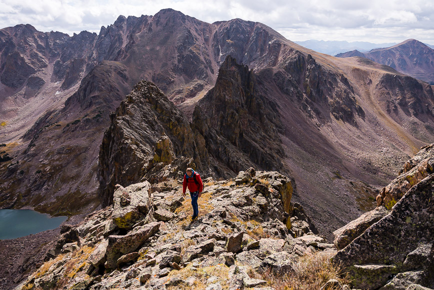 Person climbing on mountain crags