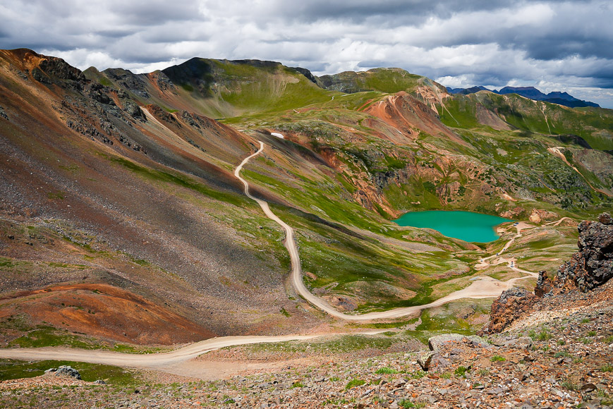 Mountains and valley with green lake