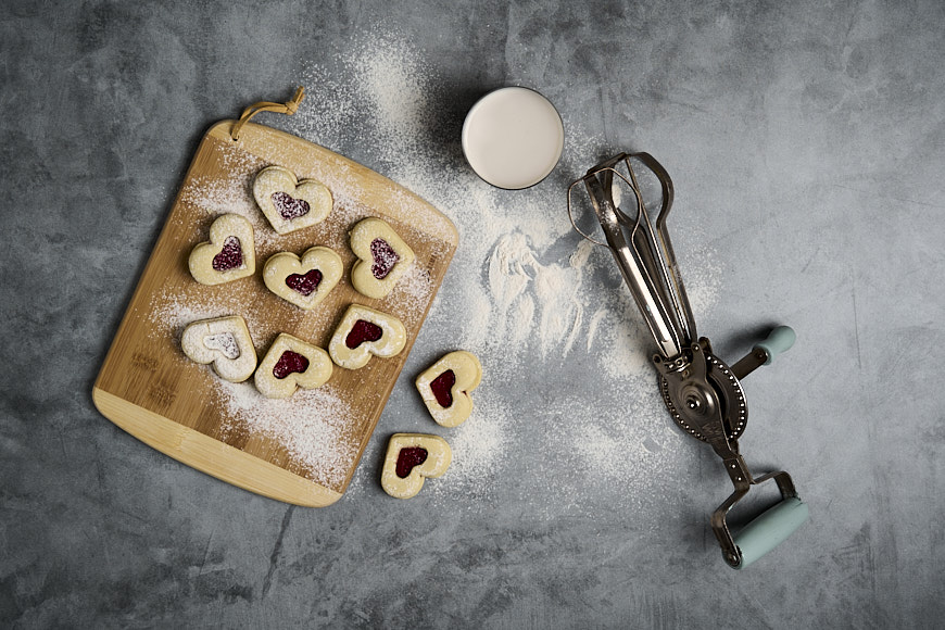 Top-down photo of utensils and cookies